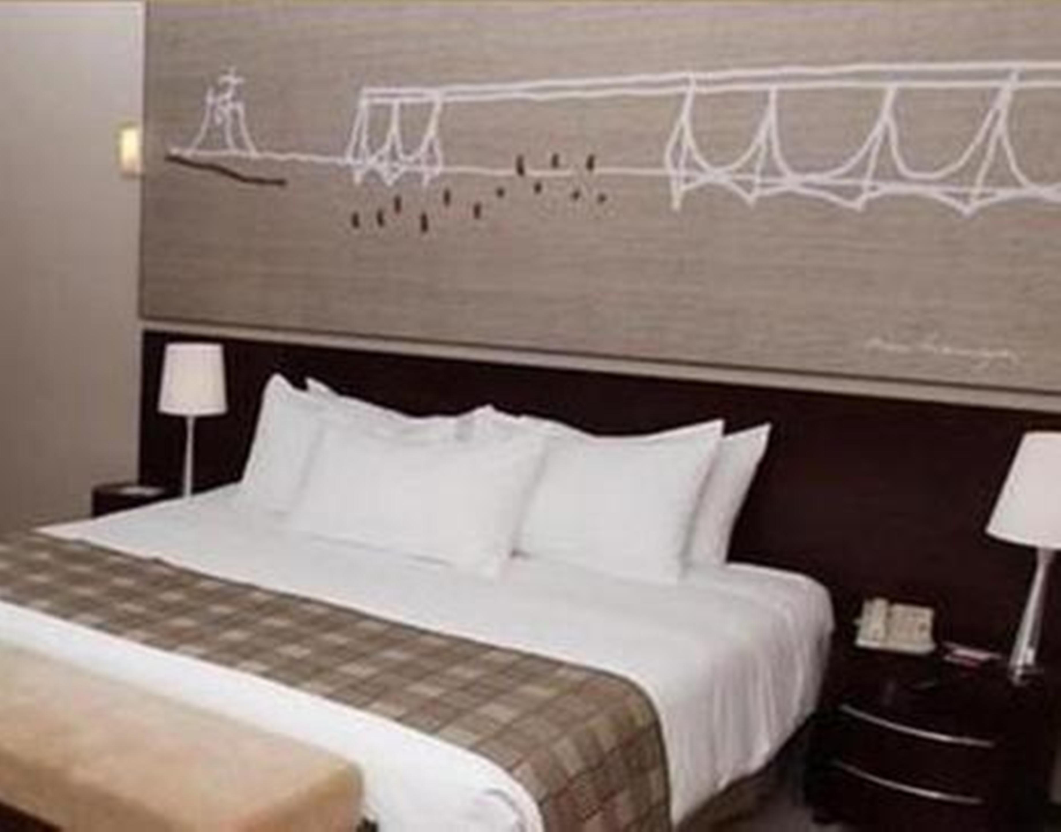Royal Tulip Brasilia Alvorada Hotel Exterior foto A bedroom at the hotel